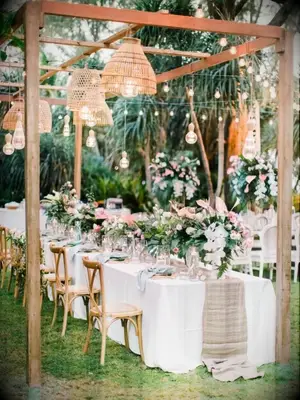 Tropical wedding reception with woven lanterns