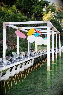 Eclectic wedding reception with colorful mobile