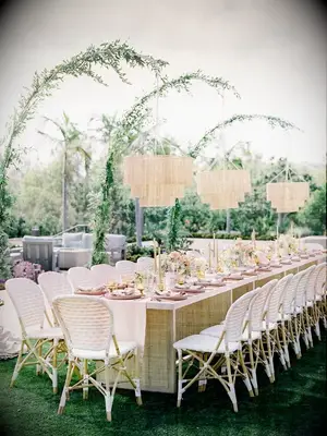 Boho outdoor wedding with wicker chandeliers