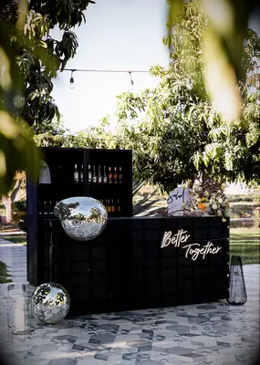 Black wedding bar with melted disco ball