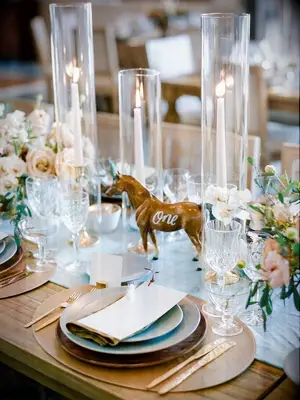 Rustic wedding tablescape with horse table number