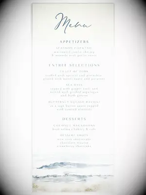 Watercolor sea design on bottom, menu items in minimalist blue type