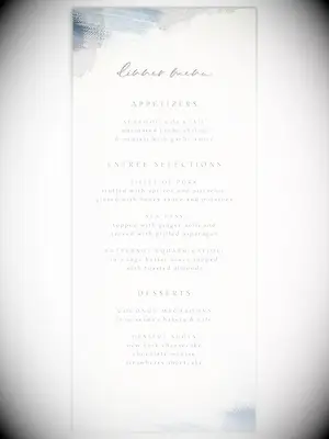 Watercolor gray and blue brushstrokes on top and bottom border with minimalist light gray type on white background