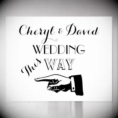 Directional black and white wedding welcome sign