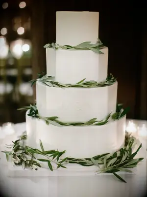 Simple wedding cake with eucalyptus garlands