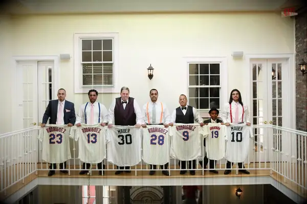 Groomsmen in Bright Suspenders with Personalized Jerseys