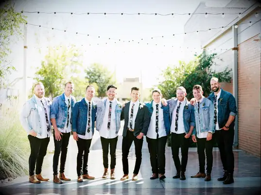 Groomsmen rocked denim jackets as a playful nod to groom