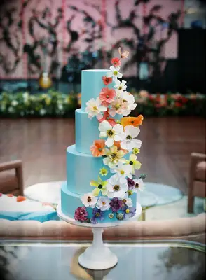 Unique Blue Cake With Four Tiers, Rainbow Ombre Flowers