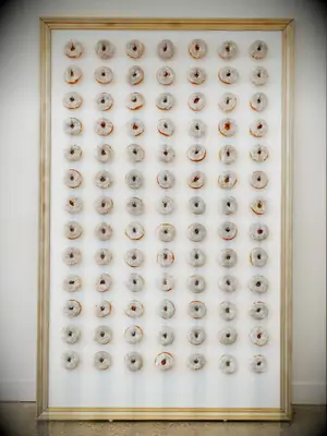 Framed donut wall at wedding