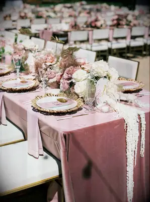These dusty rose floral arrangements provide an elegant twist for the big day.