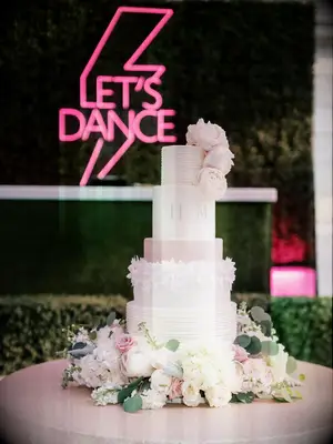 This gorgeous cake combines white and pale blush pink buttercream.