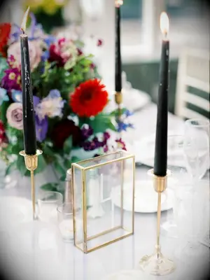 Black taper candles at a Halloween wedding