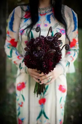Purple wedding bouquet at a Halloween wedding