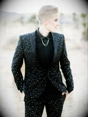 Black wedding suit at a Halloween wedding