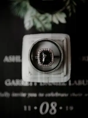 Black engagement ring at a Halloween wedding