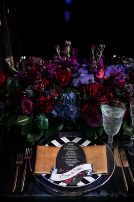 Purple and black color scheme at a Halloween wedding