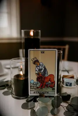 Tarot card table numbers at a Halloween wedding