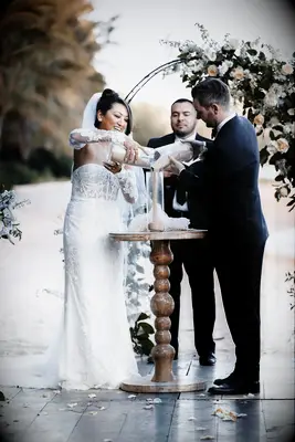 Have a sand unity ceremony at your beach wedding celebration