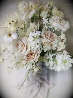 Neutral wedding bouquet with tan roses 