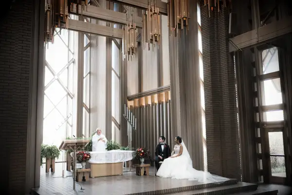 Rich Reds and Soft Greenery church wedding decor