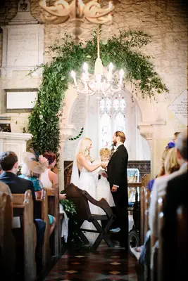 Church Ceremony with Chandelier and Greenery