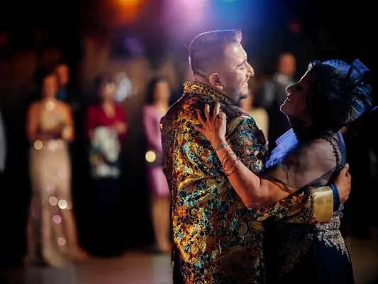 mother and son dancing at wedding reception