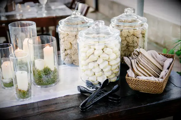 Cookie jar wedding dessert table with candles