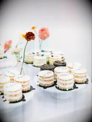 mini naked cakes at wedding dessert buffet