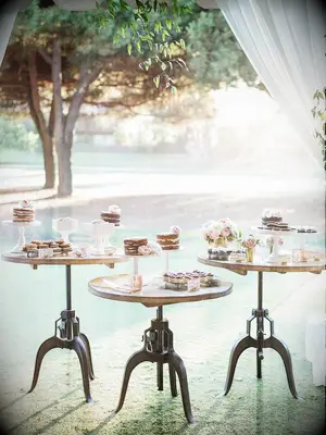 trio of dessert tables with mini wedding cakes