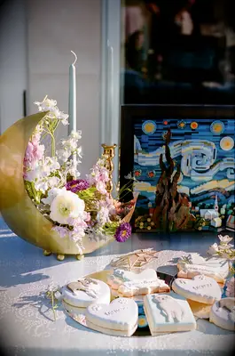 Wedding Dessert Table With Moon Flower Arrangement