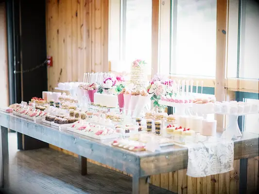Pink and white wedding dessert buffet
