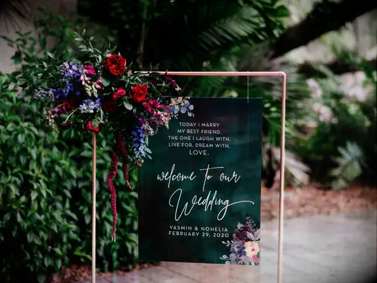 emerald green acrylic wedding welcome sign on copper metal frame