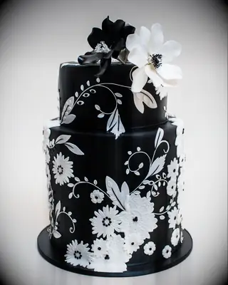 Black and white floral print wedding cake. 