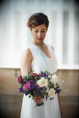 A lovely indigo, wine, and white-toned bouquet