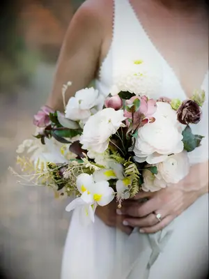 This autumn bouquet is simply showstopping, with its wide variety of flowers in complementary tones.