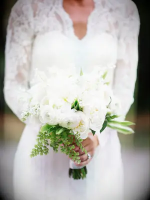 This petite white wedding bouquet is lacy and delicate.