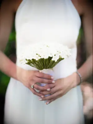 This small white stephanotis wedding bouquet is sure to stun.