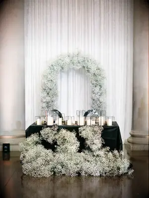 modern wedding sweetheart table idea decorated with white baby