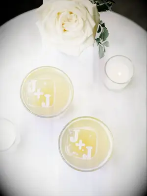 monogrammed ice cubes in cocktail glasses for signature wedding drink