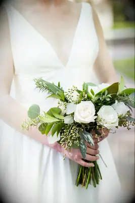 small wedding bouquet with white roses and greenery