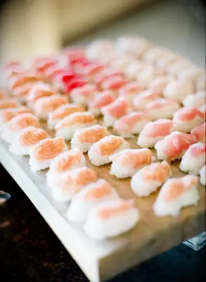 A tray of sushi nigiri with tuna and salmon for your wedding food ideas