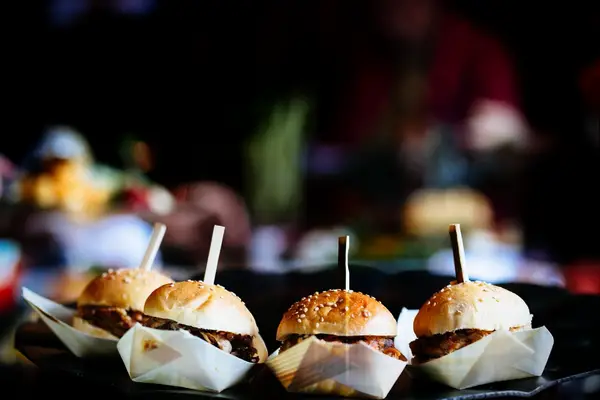 Tiny burger sliders for your wedding reception food ideas