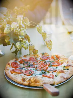 Wood fired tomato and basil pizza for your wedding meal