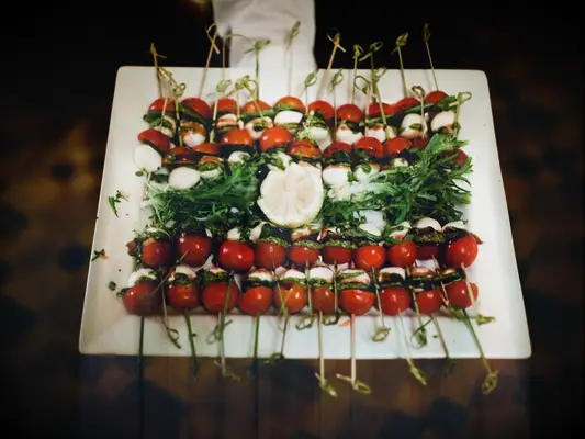Caprese skewers of tomato, mozzarella and basil