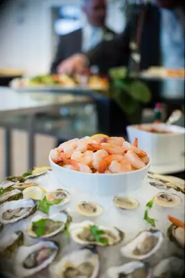 Raw seafood bar for a summery wedding reception food option