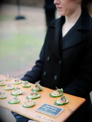 Saffron hummus on cucumber slices for your wedding food ideas