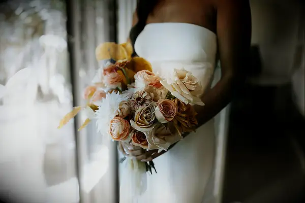simple yellow and peach fall wedding bouquet