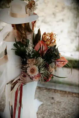 boho fall bouquet with pink anthurium and greenery
