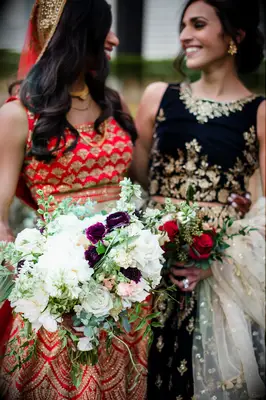 elegant fall wedding bouquets with burgundy ranunculus