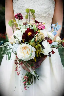unique fall wedding bouquet with burgundy, blue and white color palette